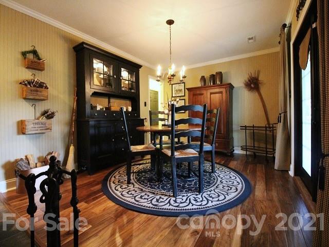 4622 Edgeland Road Edgemoor, SC 29712 - Photo 11 of 29 a living room with furniture and a chandelier