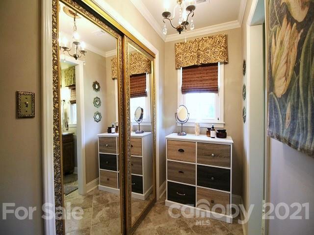 4622 Edgeland Road Edgemoor, SC 29712 - Photo 14 of 29 a bathroom with a double vanity sink and glass door