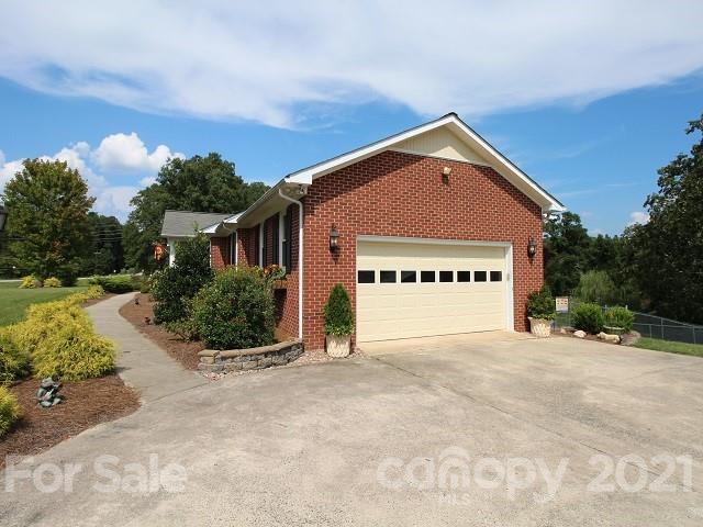 4622 Edgeland Road Edgemoor, SC 29712 - Photo 22 of 29 a front view of a house with a yard and garage