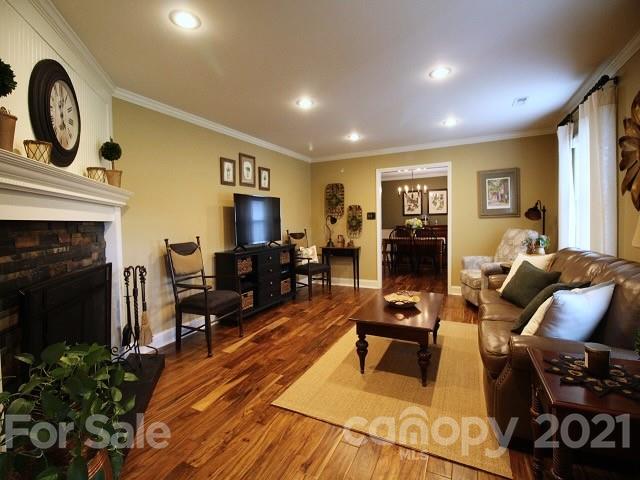 4622 Edgeland Road Edgemoor, SC 29712 - Photo 6 of 29 a living room with furniture and a fireplace