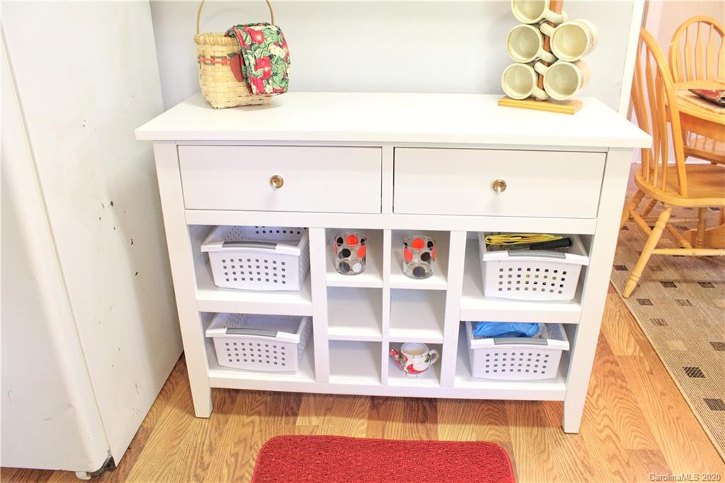 128 Murray Road Canton, NC 28716 - Photo 6 of 29 a view of a book shelf with furniture