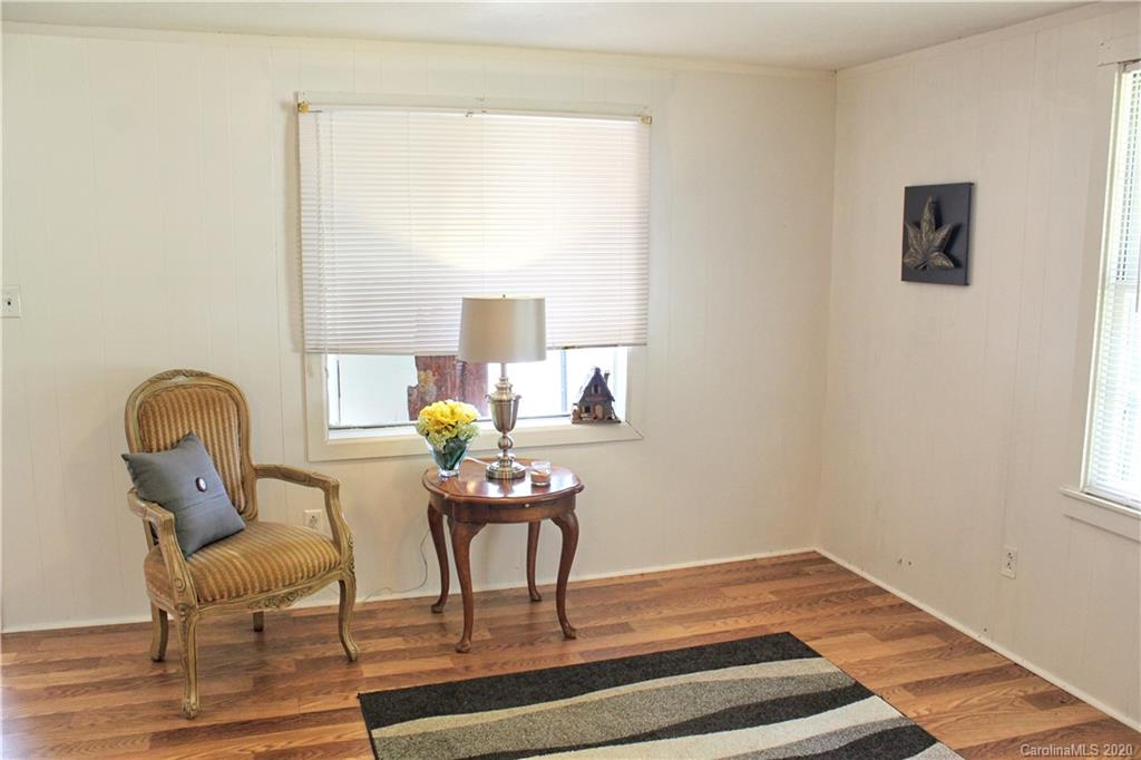 128 Murray Road Canton, NC 28716 - Photo 9 of 29 a workspace with furniture and a window