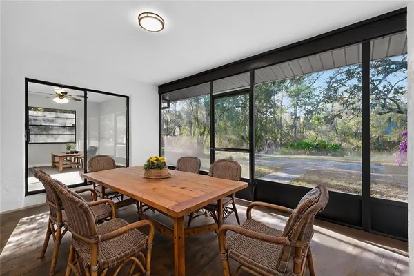 a view of empty room with floor to ceiling window