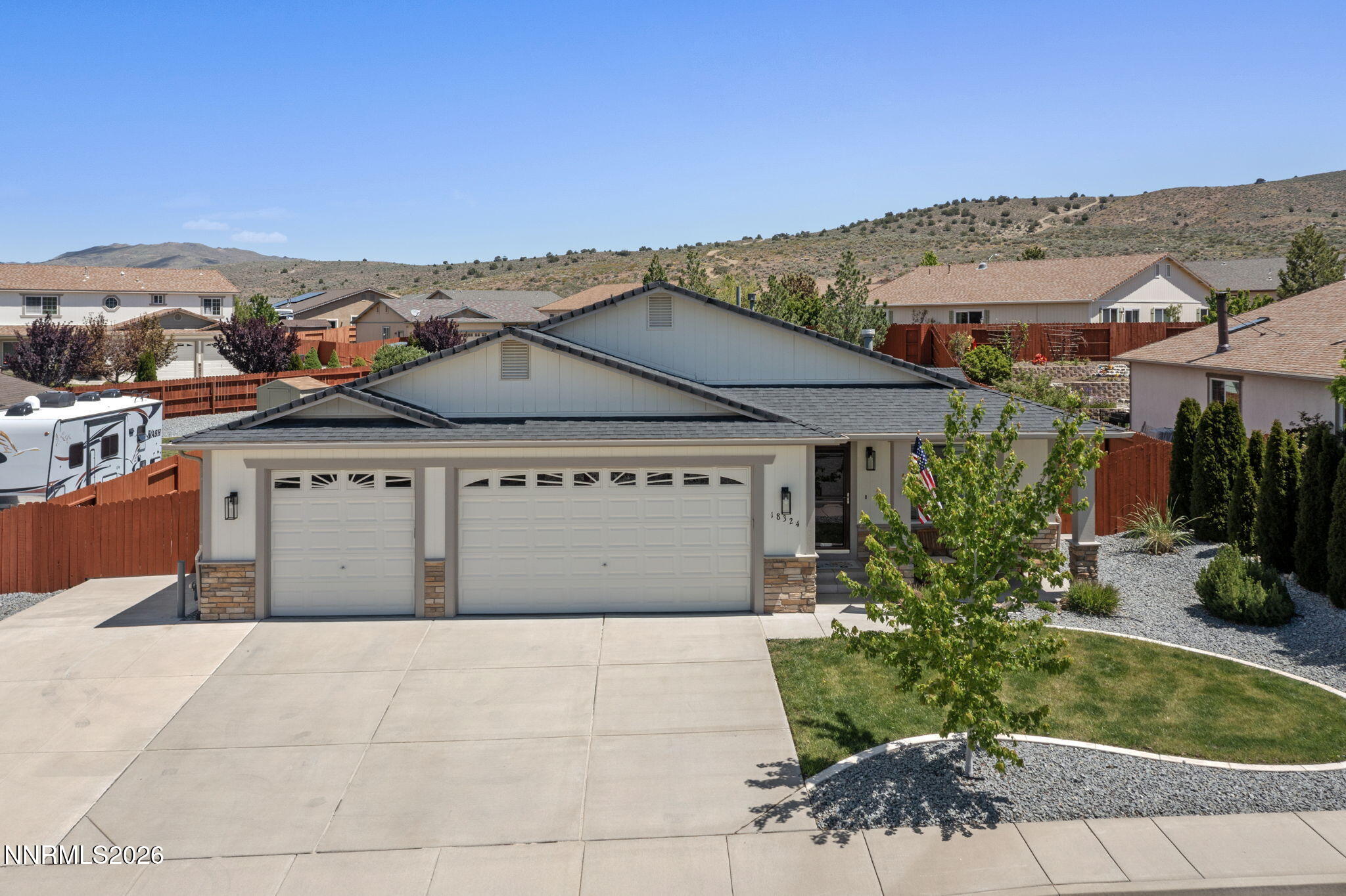 18324 Panda Bear Court Reno, NV 89508 - Photo 28 of 44 a front view of a house with garden