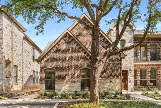 a view of a building with a yard