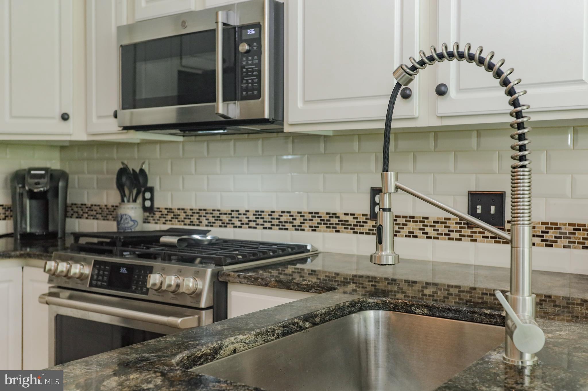 4 Jester Street Bear, DE 19701 - Photo 9 of 32 Kitchen with new granite, tile, and ss appl