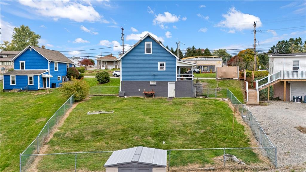 2065 Brodhead Road Aliquippa, PA 15001 - Photo 4 of 6 a house view with a garden space
