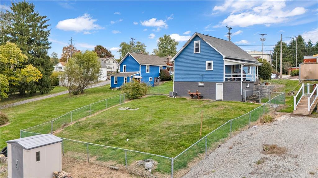 2065 Brodhead Road Aliquippa, PA 15001 - Photo 5 of 6 a front view of a house with garden