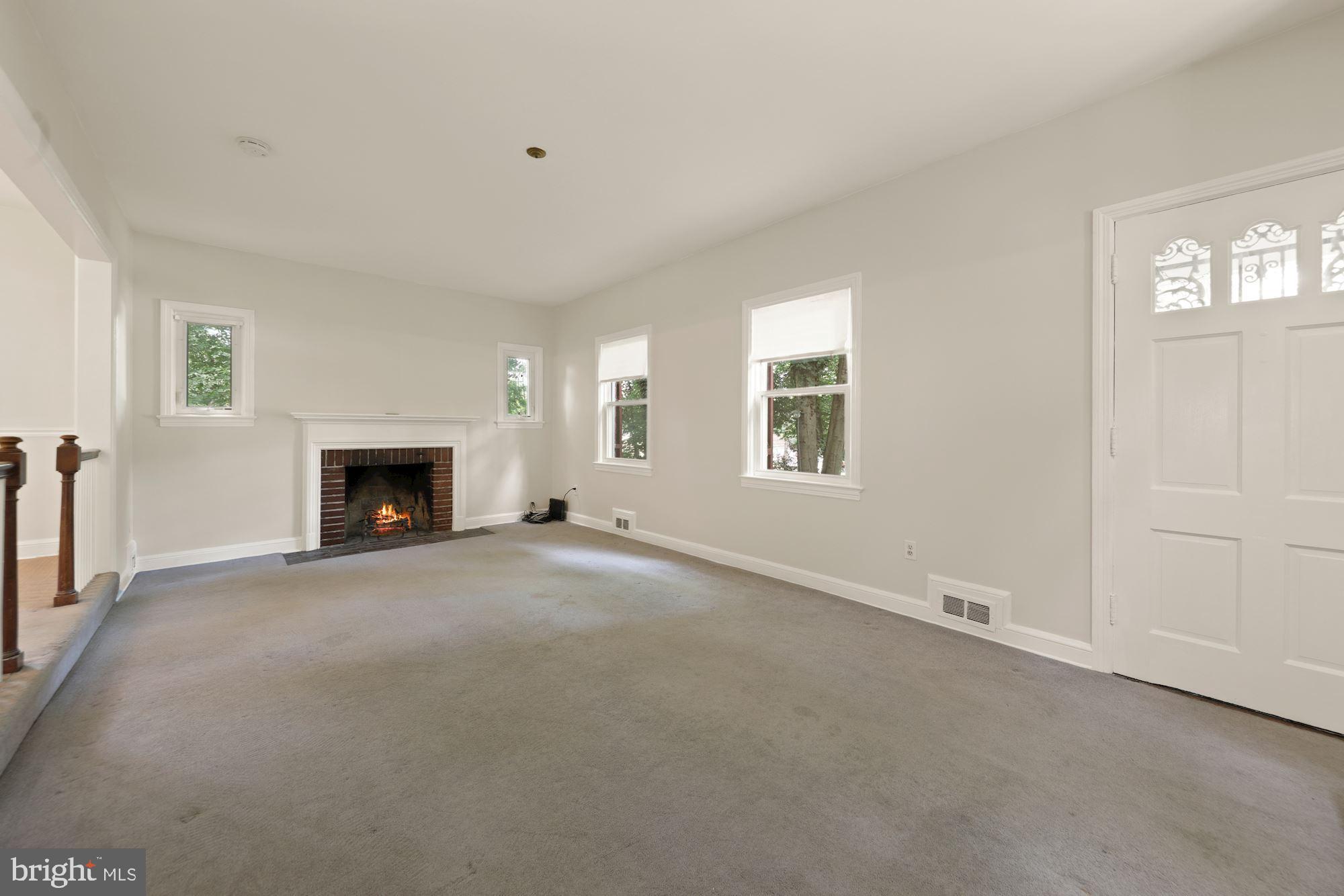 8108 Piney Branch Road Silver Spring, MD 20910 - Photo 6 of 32 Generous sized living room with fireplace