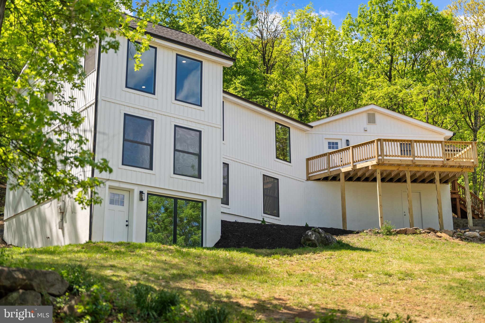1550 Drummer Hill Road Front Royal, VA 22630 - Photo 1 of 49 a house with yard in front of it