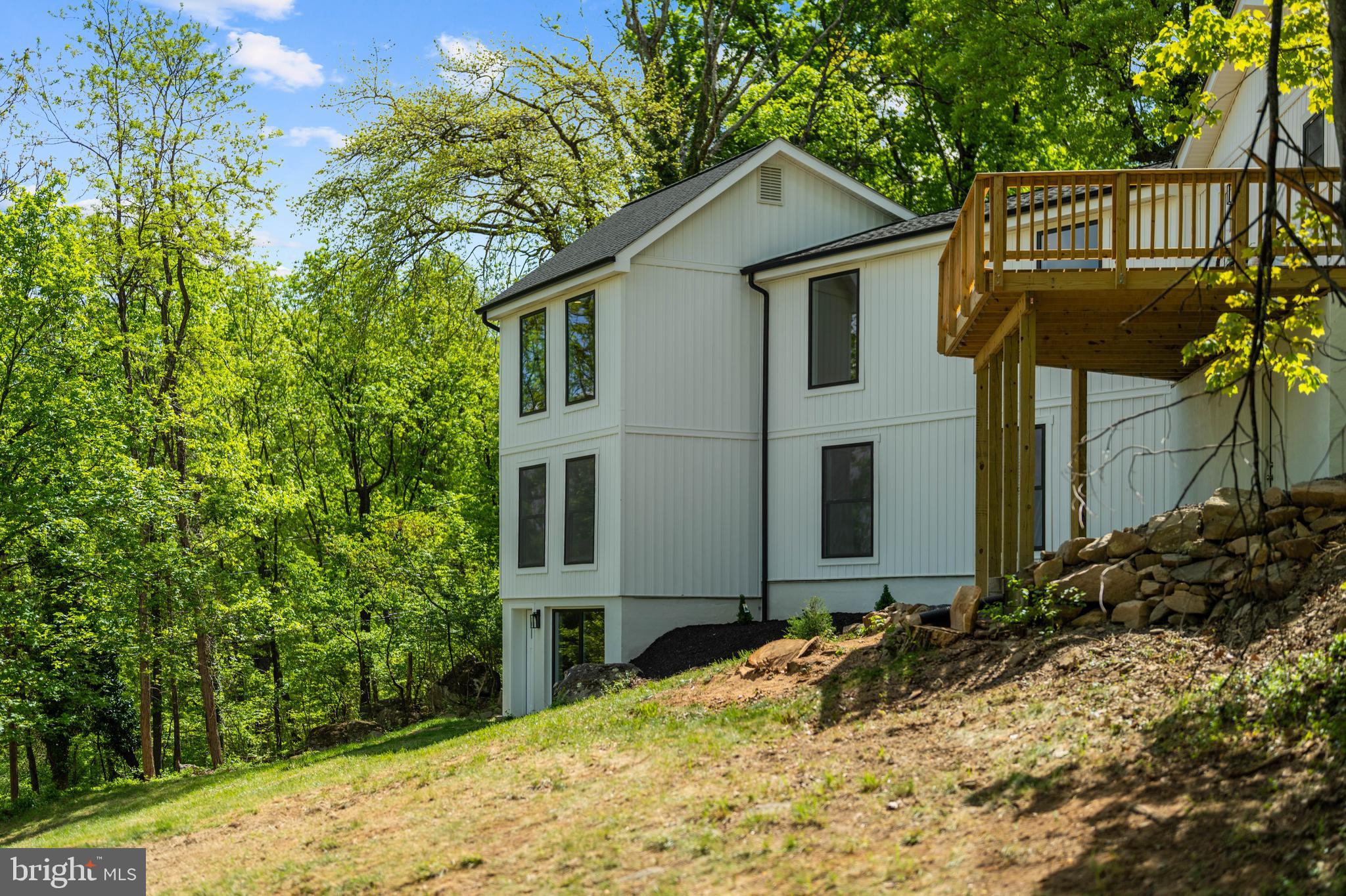 1550 Drummer Hill Road Front Royal, VA 22630 - Photo 6 of 49 a front view of a house with a yard