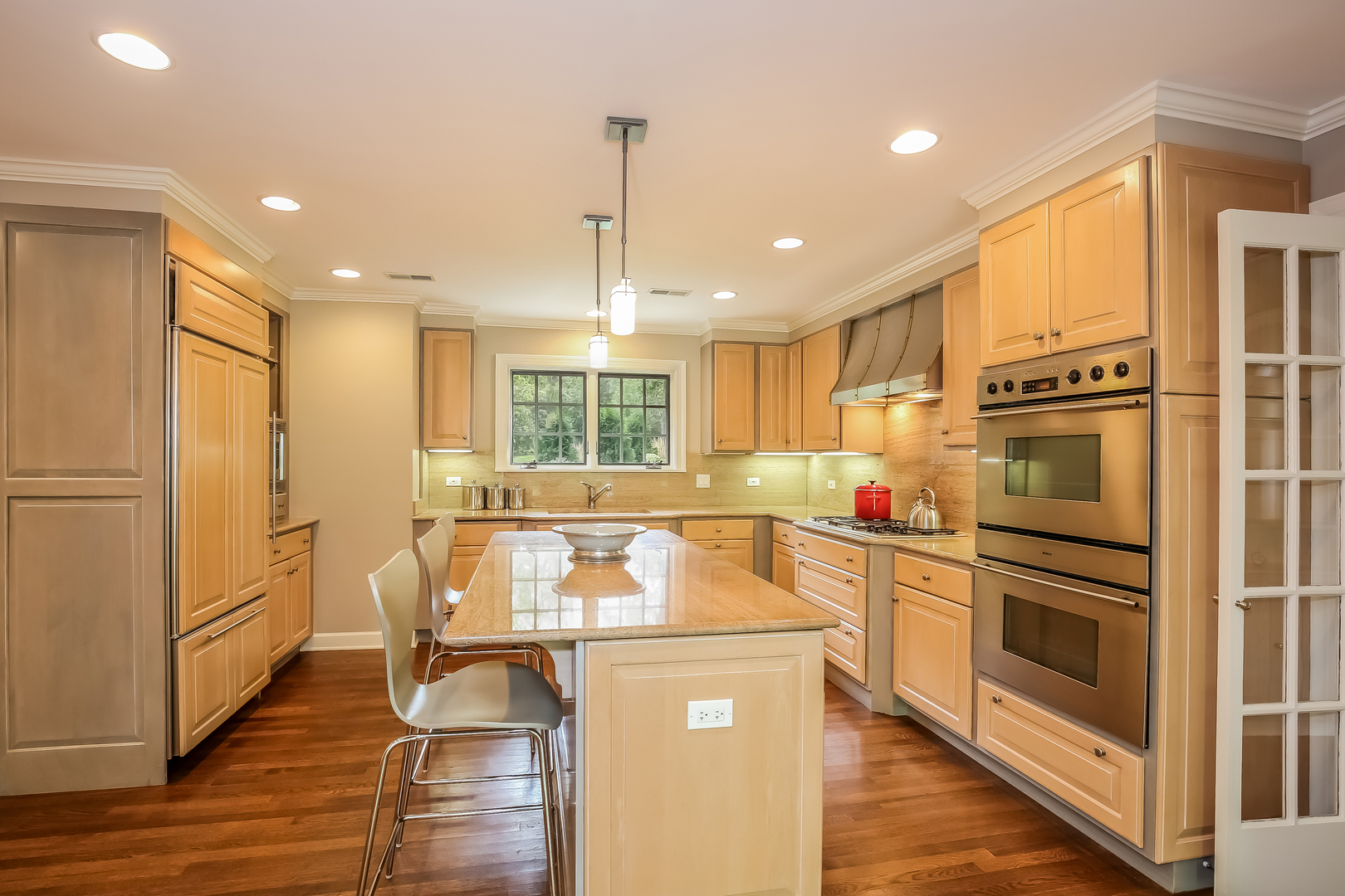 1020 East Westleigh Road Lake Forest, IL 60045 - Photo 12 of 31 a kitchen with stainless steel appliances granite countertop a refrigerator and a stove top oven