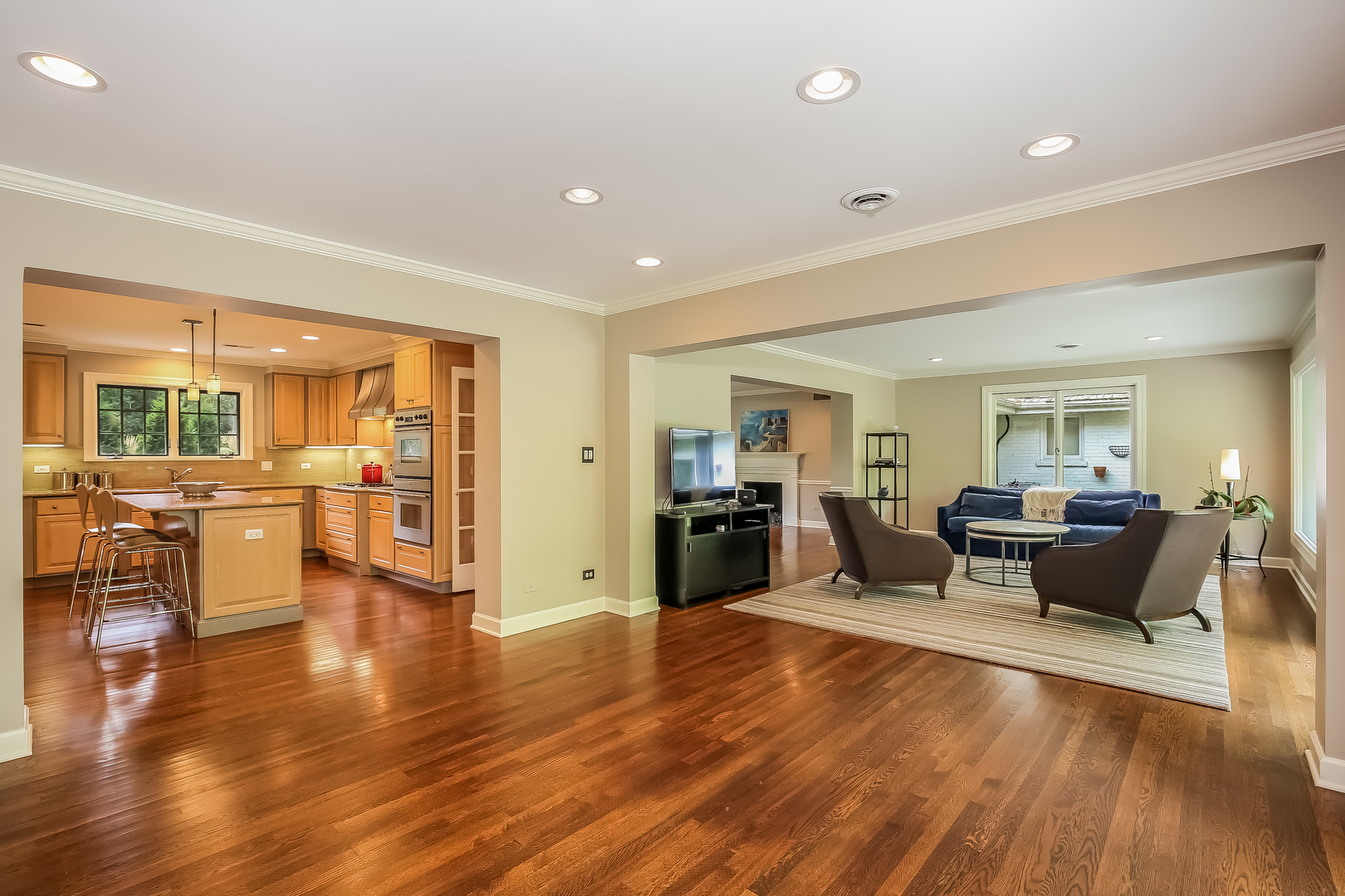 1020 East Westleigh Road Lake Forest, IL 60045 - Photo 14 of 31 a living room with furniture floor to ceiling window and kitchen view