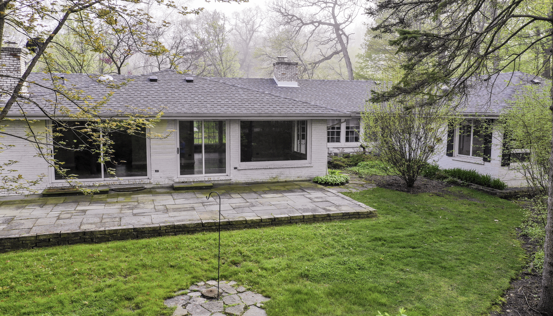 1020 East Westleigh Road Lake Forest, IL 60045 - Photo 27 of 31 a view of a house with a garden
