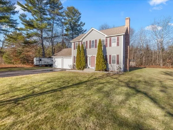 front view of a house with a yard