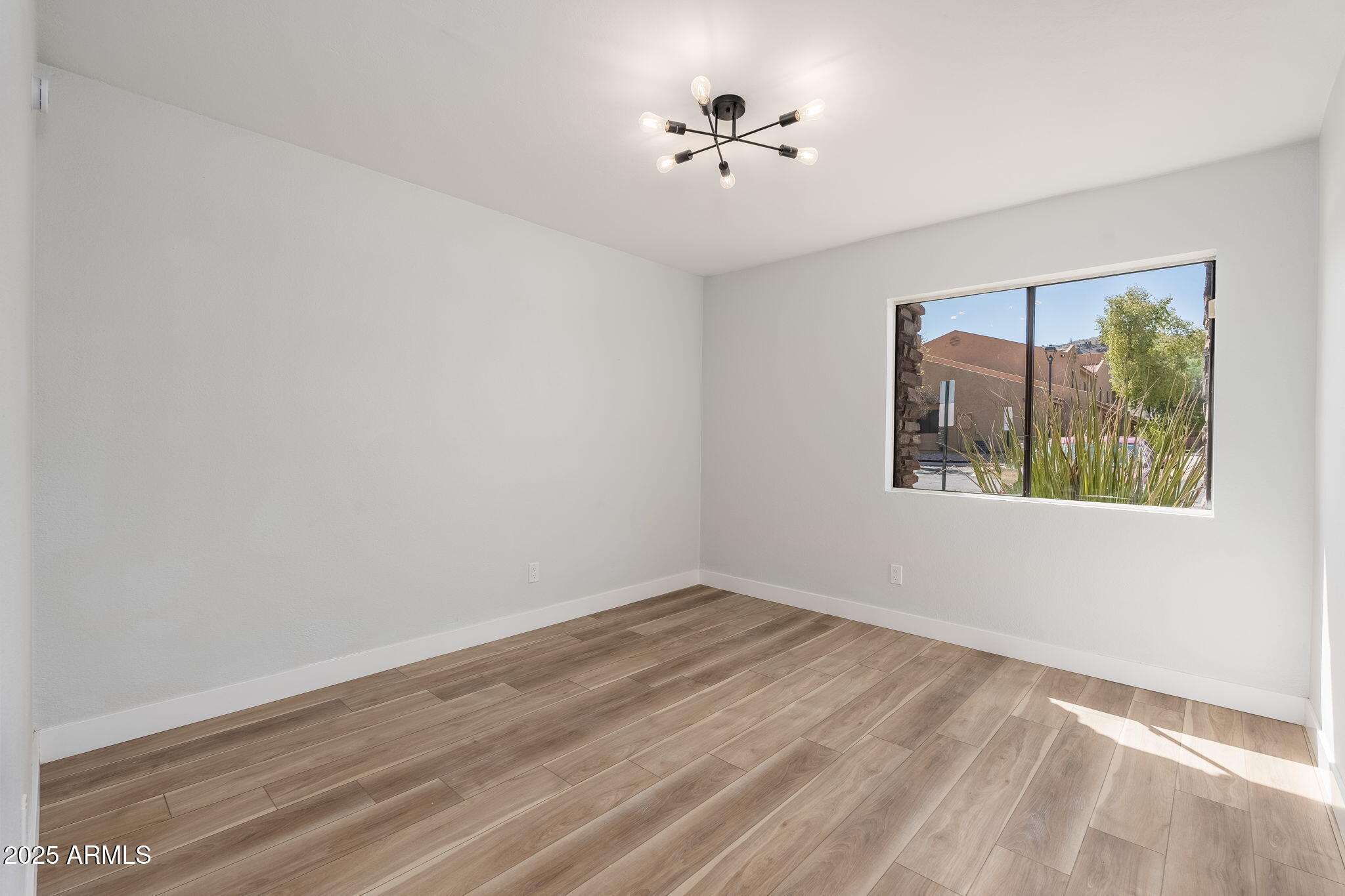 3511 East Baseline Road, Unit 1200 Phoenix, AZ 85042 - Photo 16 of 28 a view of empty room with window