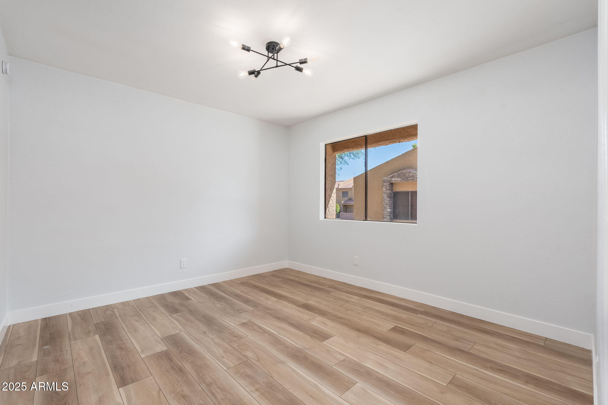 3511 East Baseline Road, Unit 1200 Phoenix, AZ 85042 - Photo 17 of 28 a view of empty room with a window