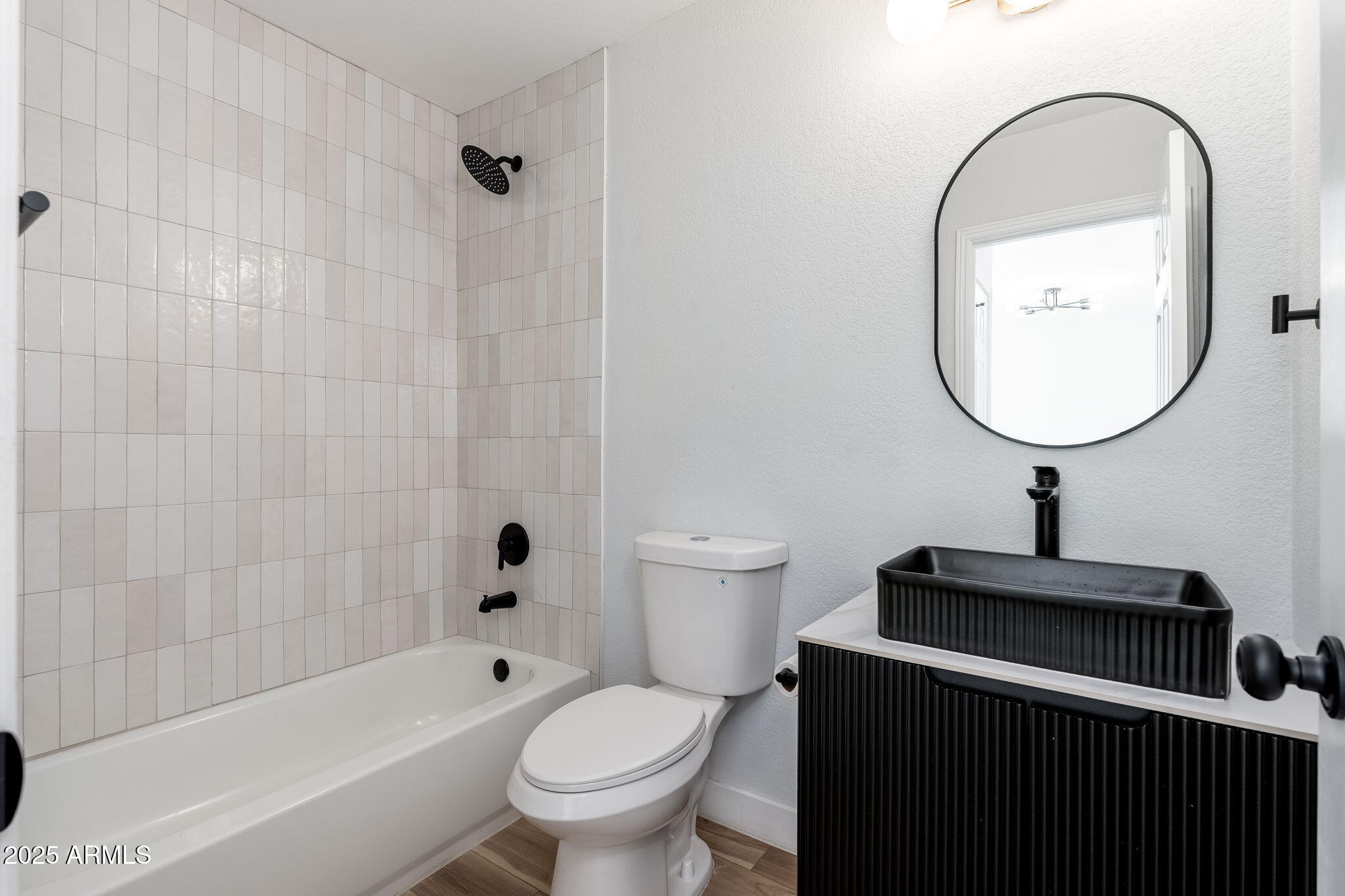 3511 East Baseline Road, Unit 1200 Phoenix, AZ 85042 - Photo 19 of 28 a bathroom with a sink a toilet and a mirror
