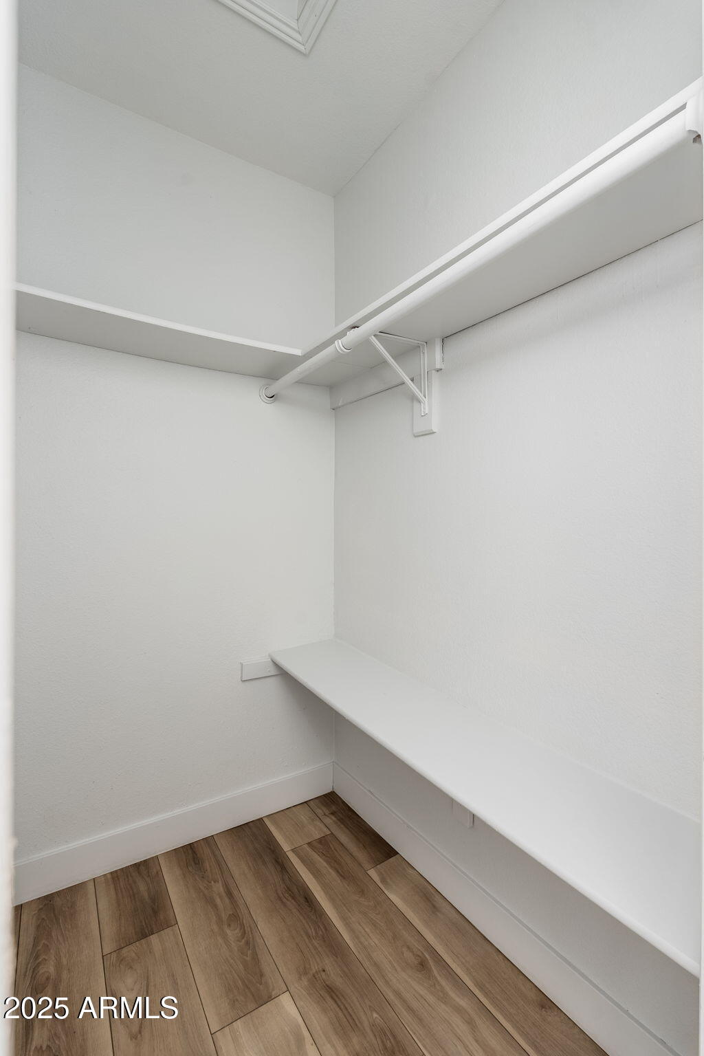 3511 East Baseline Road, Unit 1200 Phoenix, AZ 85042 - Photo 20 of 28 a view of an empty walk in closet