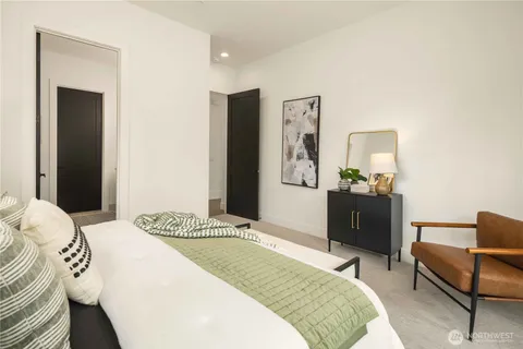 a bedroom with a bed and furniture