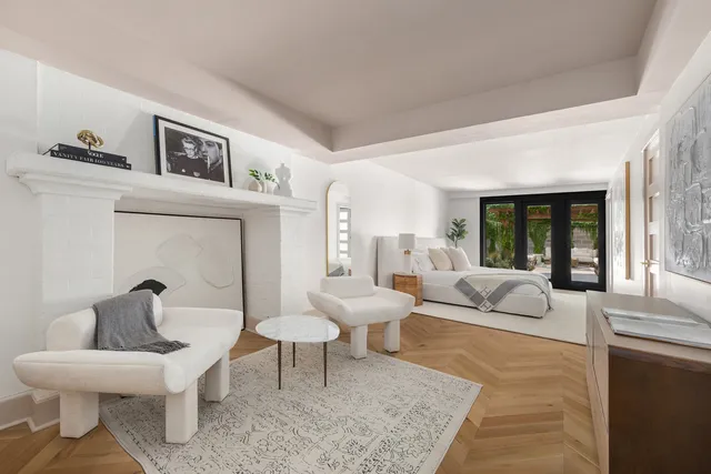 a view of a lake with sitting area