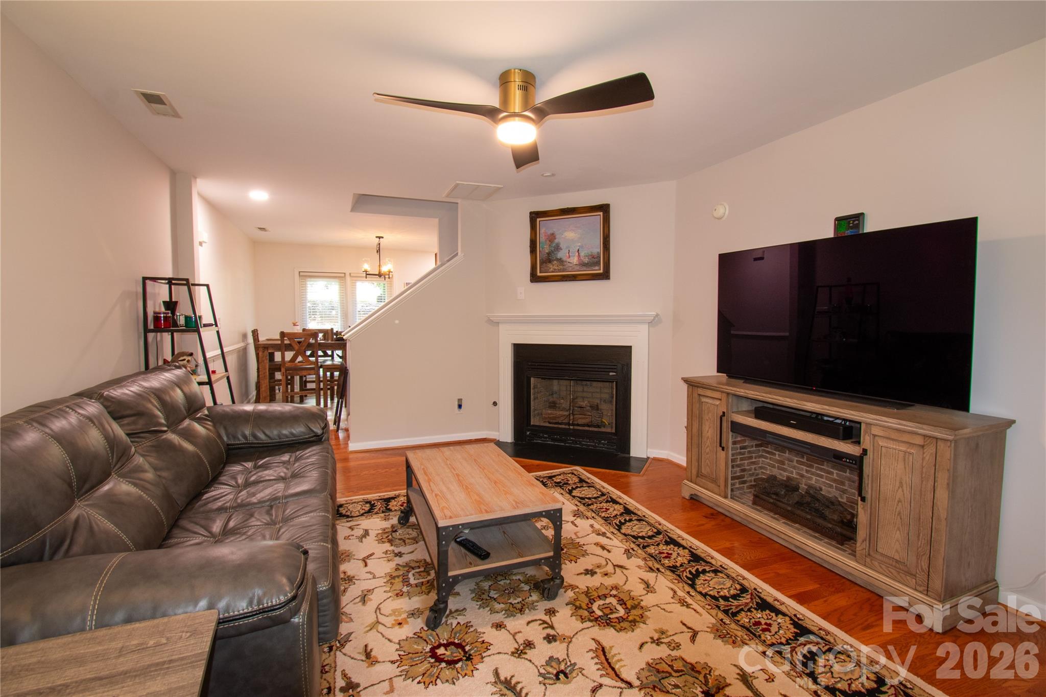 19 Singleton Lane Fletcher, NC 28732 - Photo 3 of 19 a living room with furniture and a flat screen tv