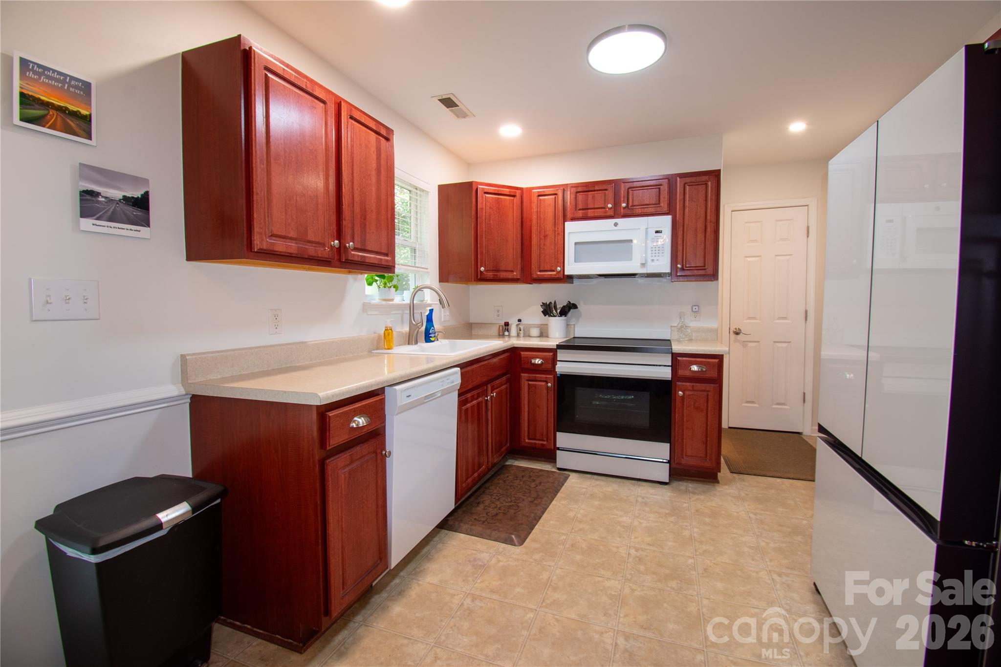 19 Singleton Lane Fletcher, NC 28732 - Photo 6 of 19 a kitchen with a sink and a stove top oven