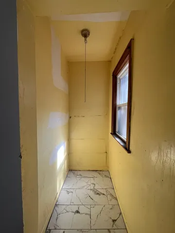 a view of a bathroom with a shower