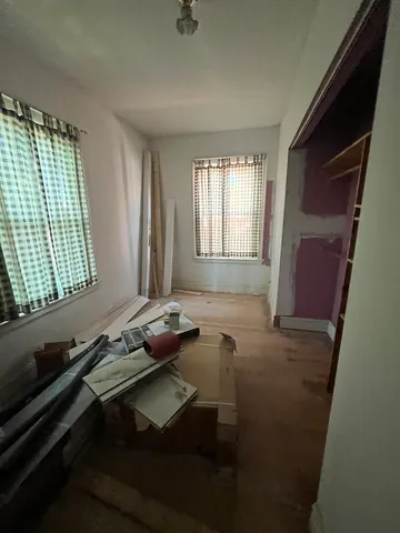 a room with furniture and window
