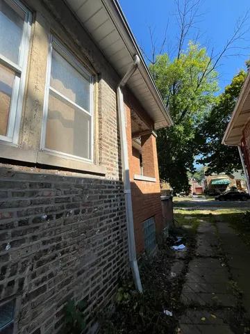a view of backyard with cabin