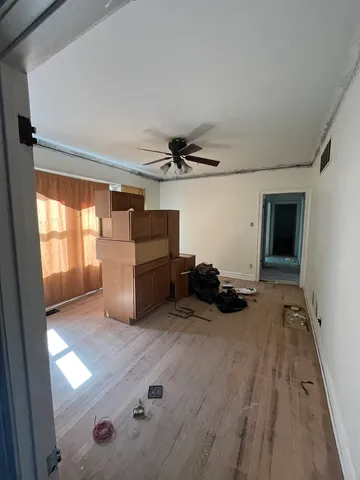 a view of a livingroom with furniture and windows