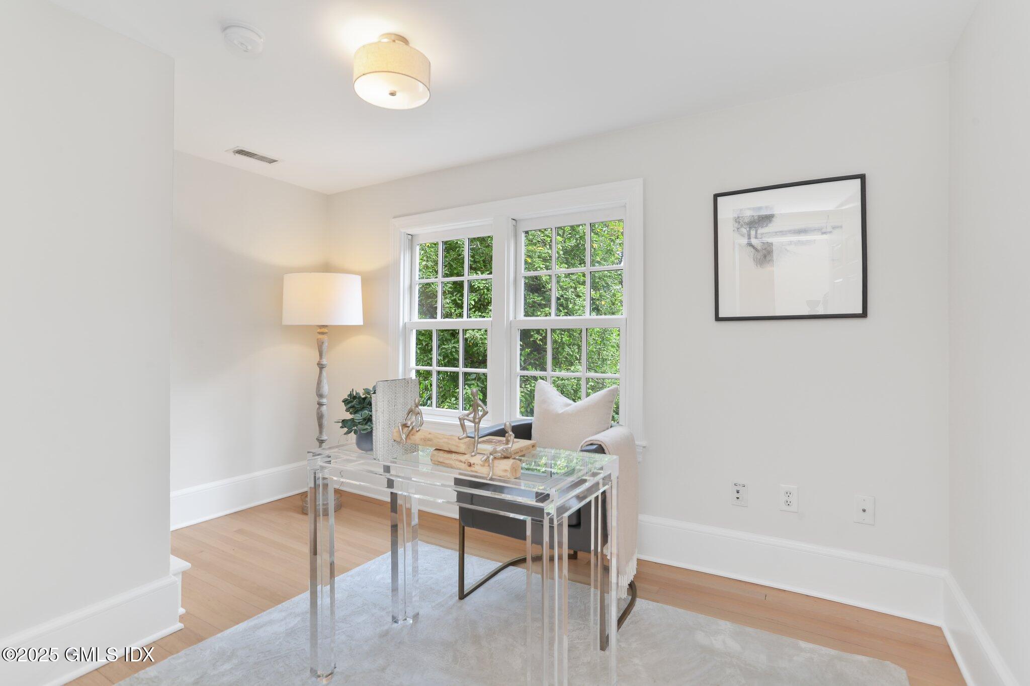 36 Hendrie Avenue Riverside, CT 06878 - Photo 16 of 33 a workspace with furniture and a window
