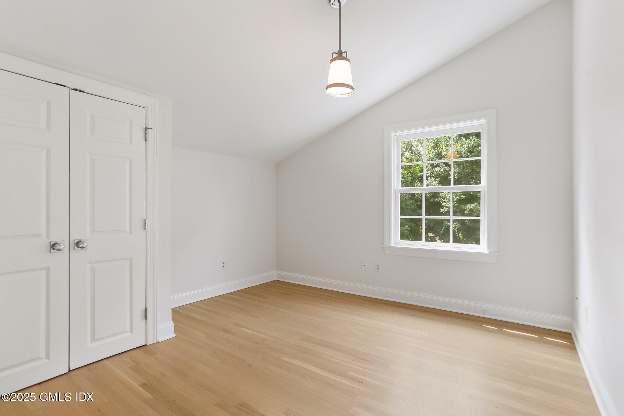36 Hendrie Avenue Riverside, CT 06878 - Photo 22 of 33 an empty room with windows