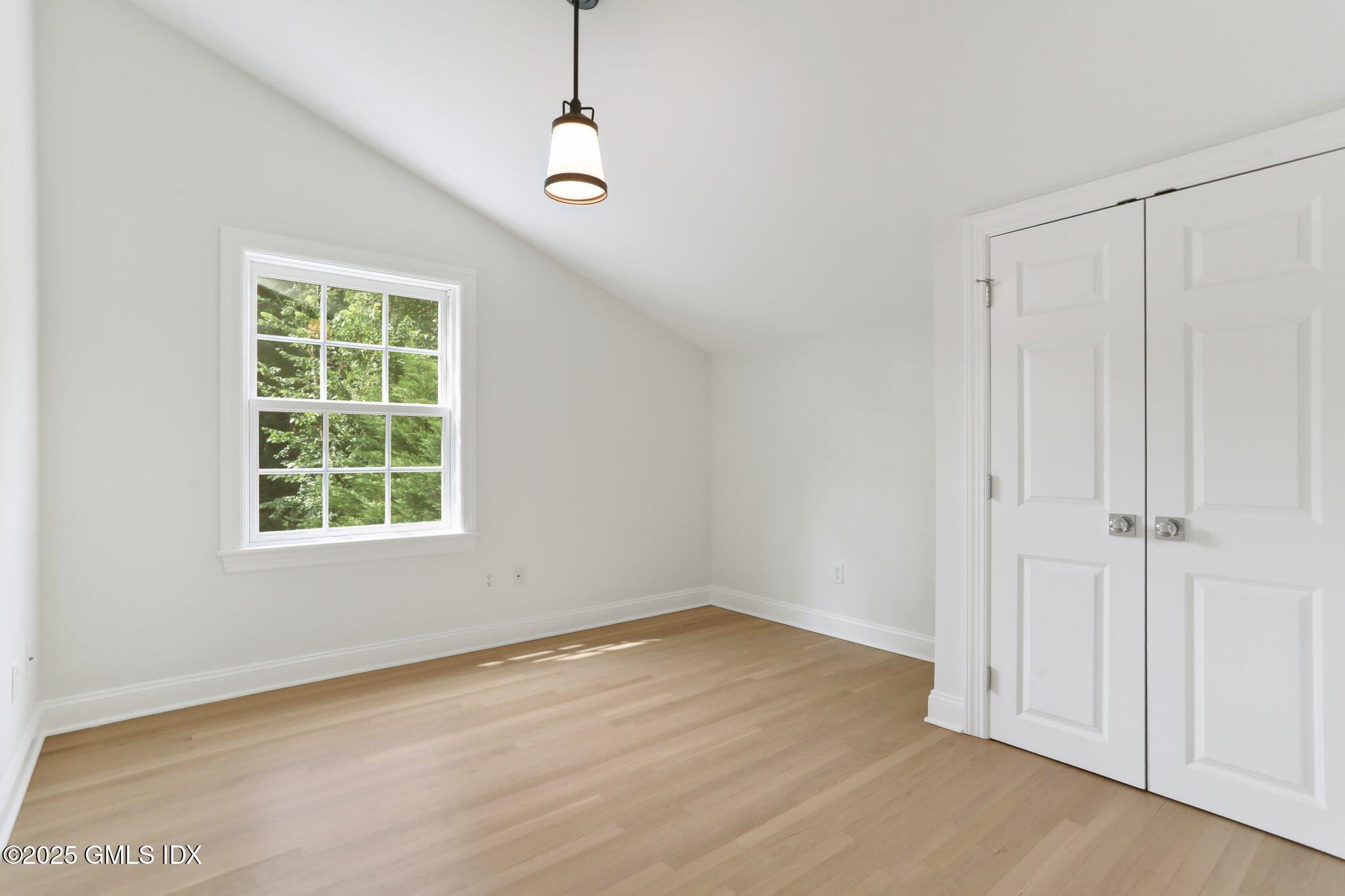 36 Hendrie Avenue Riverside, CT 06878 - Photo 24 of 33 an empty room with a window