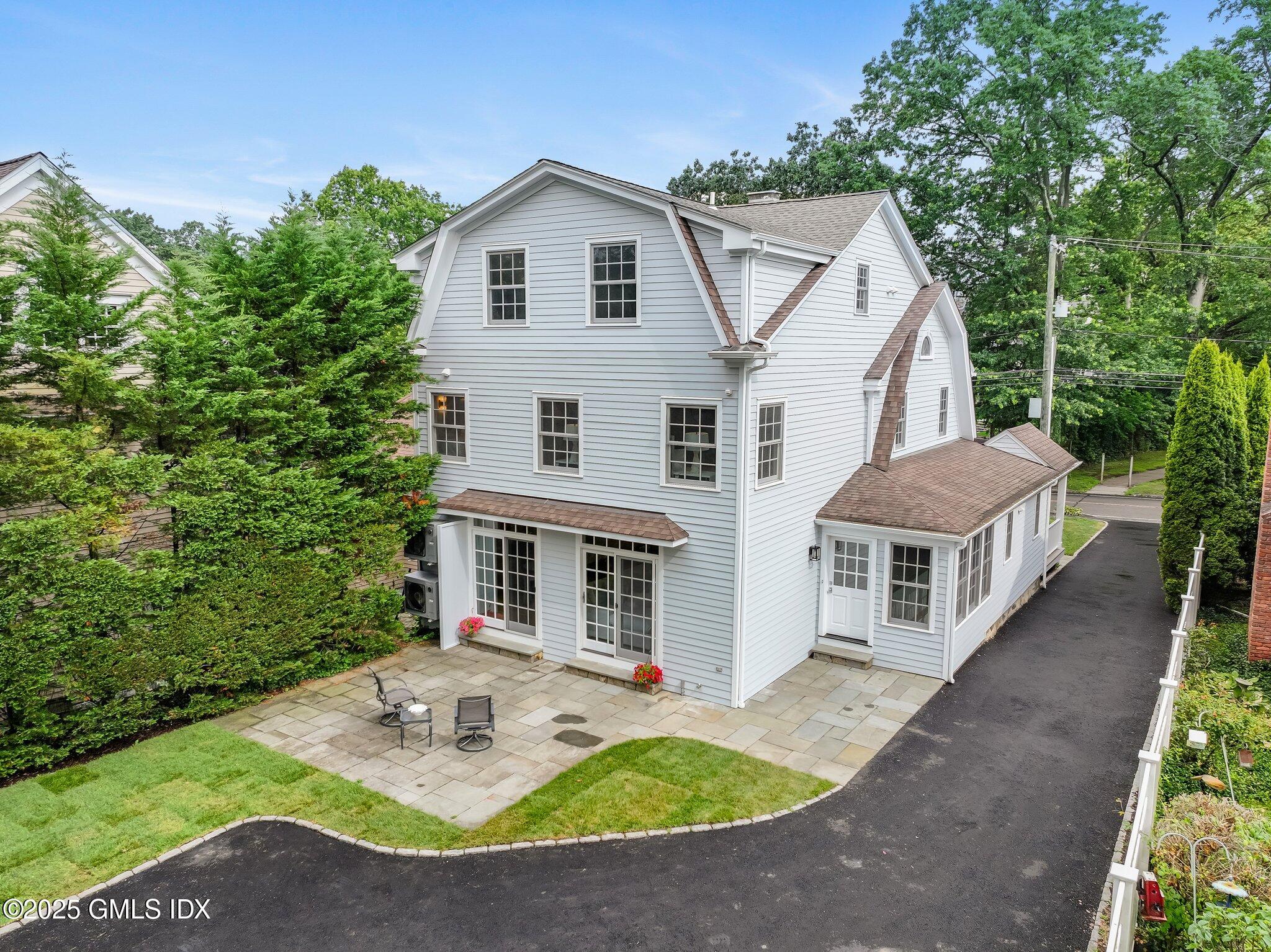 36 Hendrie Avenue Riverside, CT 06878 - Photo 3 of 33 a view of house with backyard and garden