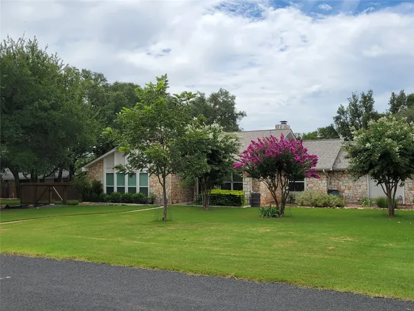 a view of a house with a swimming pool