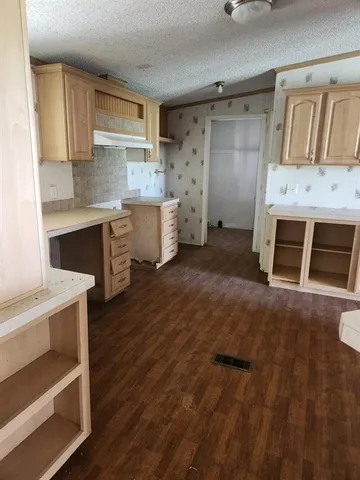 a front view of a house with a garage