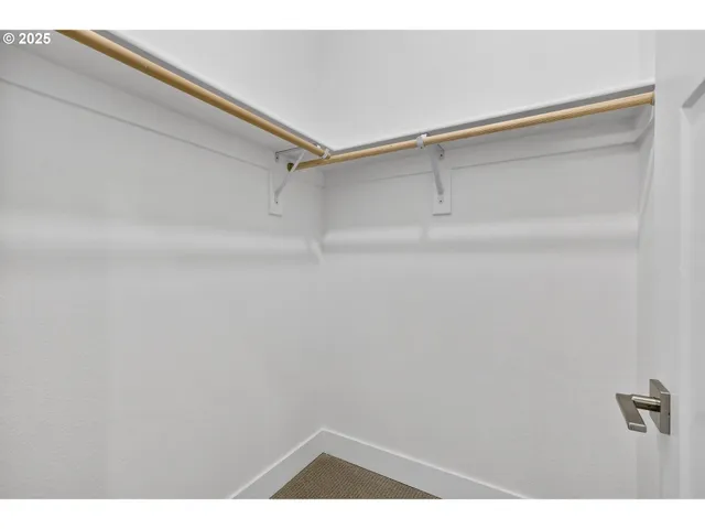 a view of small space with racks on the wall