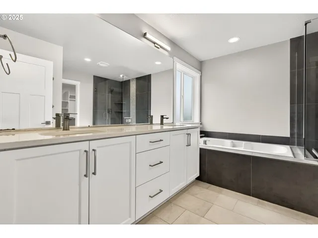 a bathroom with a sink a mirror and a