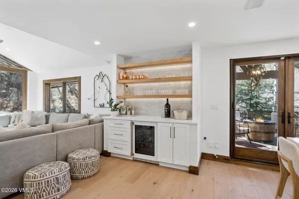 a living room with furniture and windows