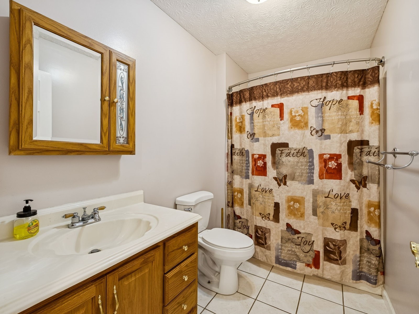 394 Pruett Road Dickson, TN 37055 - Photo 23 of 56 a bathroom with a sink toilet and shower
