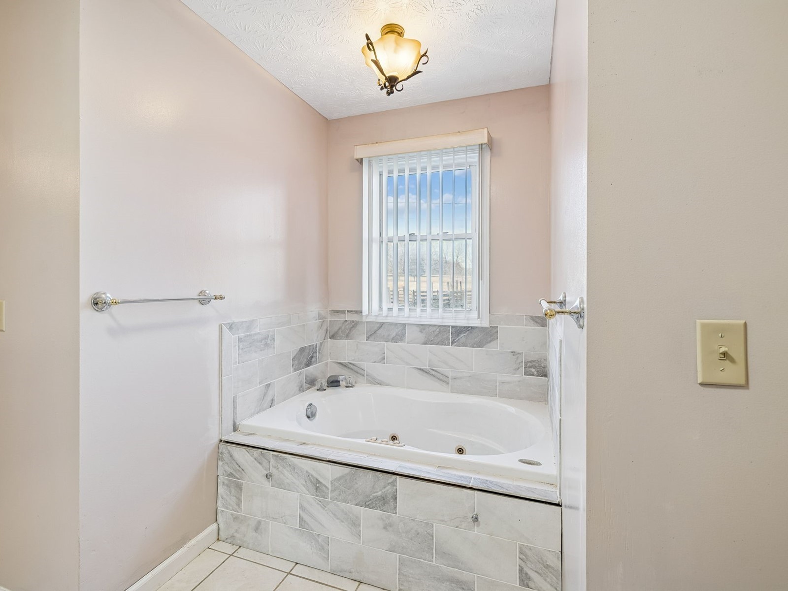 394 Pruett Road Dickson, TN 37055 - Photo 32 of 56 a white bath tub sitting next to a window