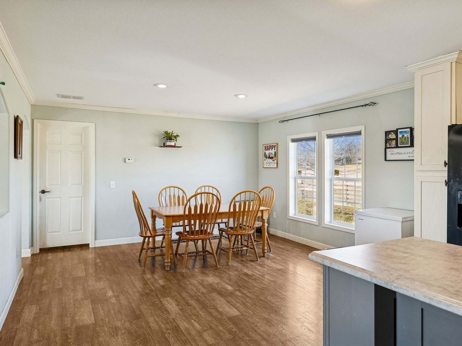 394 Pruett Road Dickson, TN 37055 - Photo 40 of 56 a view of a dining room with furniture window and wooden floor