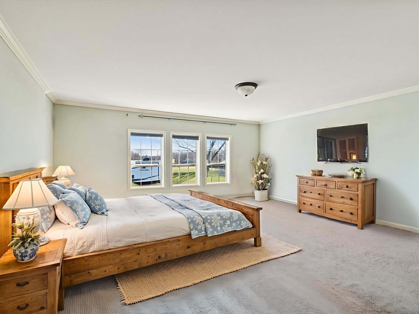 394 Pruett Road Dickson, TN 37055 - Photo 45 of 56 a bedroom with a bed and a tv