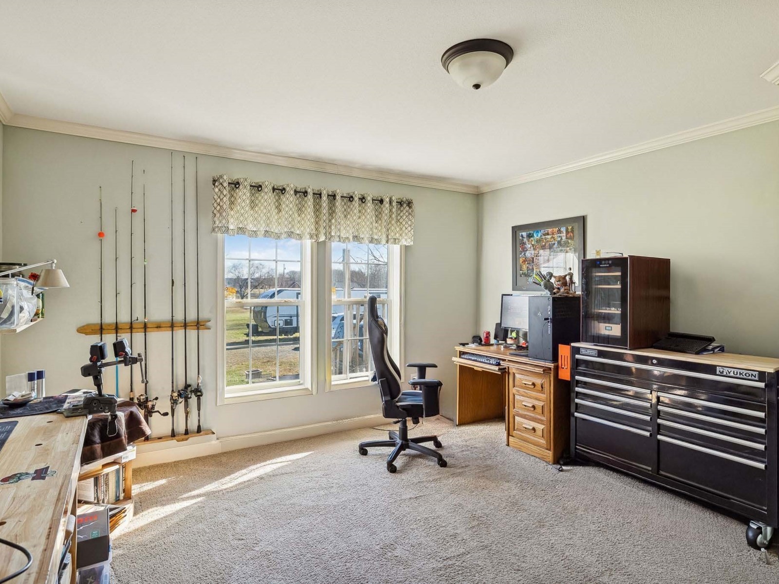 394 Pruett Road Dickson, TN 37055 - Photo 48 of 56 a view of a workspace with furniture and a window