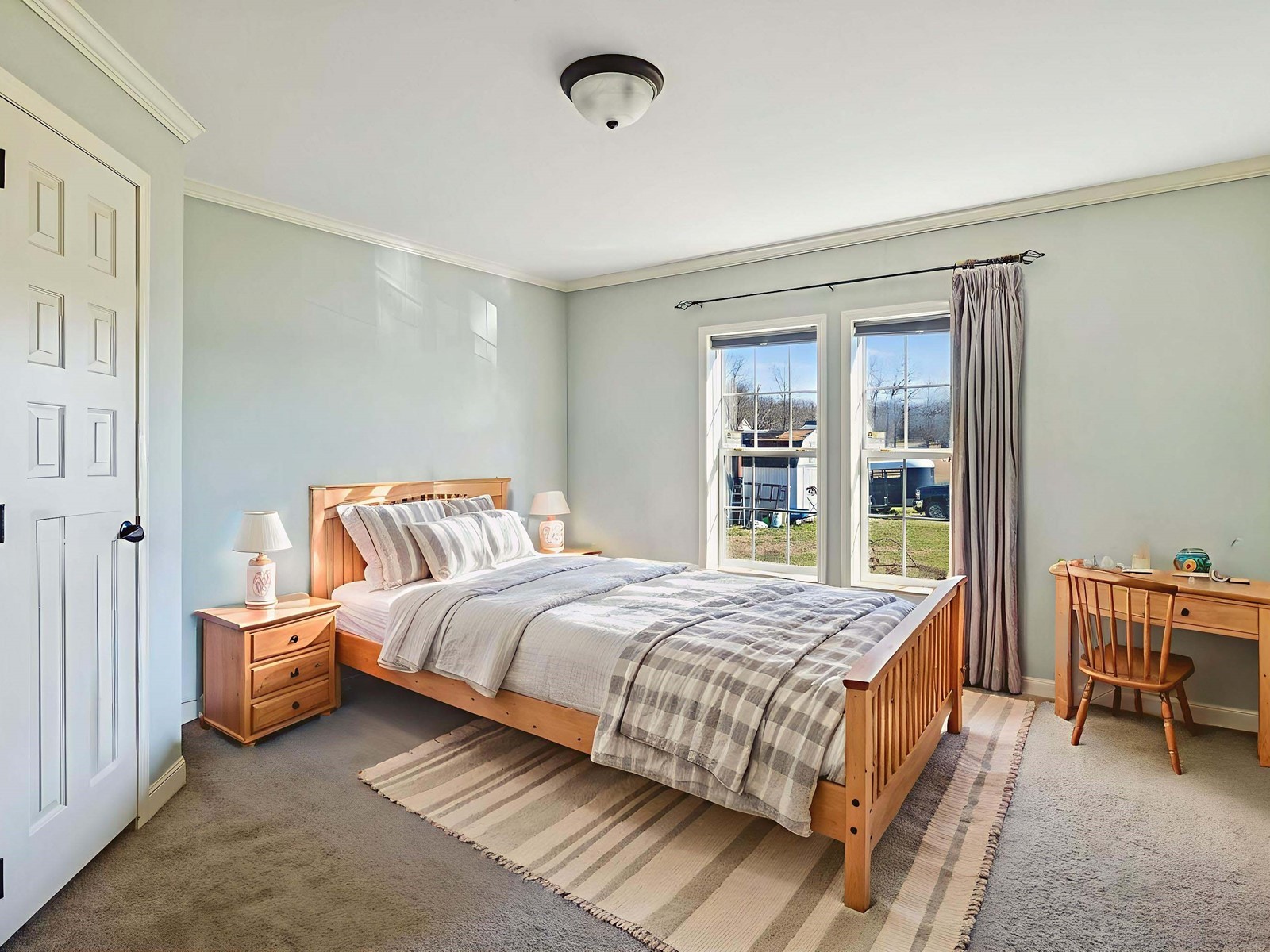 394 Pruett Road Dickson, TN 37055 - Photo 49 of 56 a bedroom with a bed and a large window