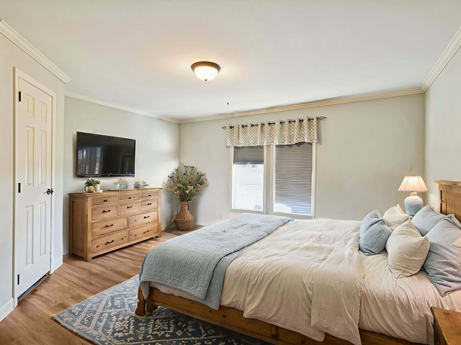 394 Pruett Road Dickson, TN 37055 - Photo 52 of 56 a bedroom with a bed and a flat screen tv