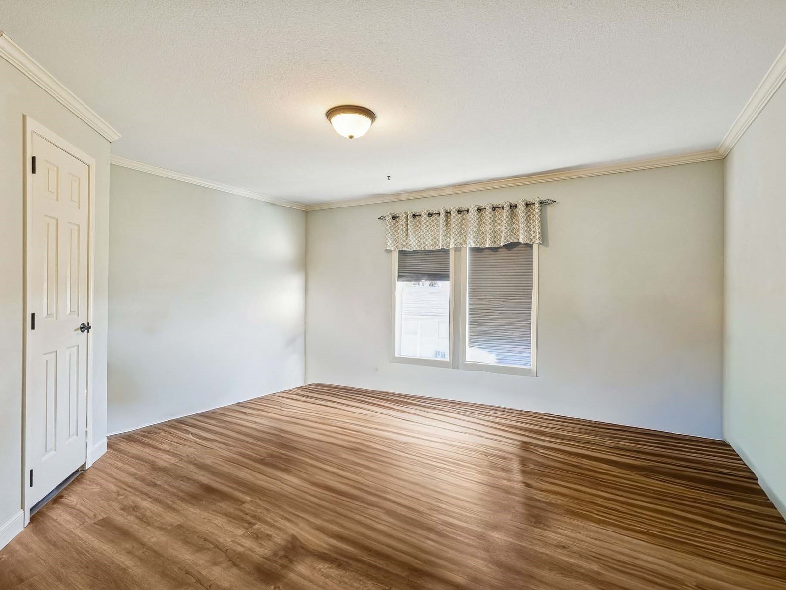 394 Pruett Road Dickson, TN 37055 - Photo 53 of 56 a view of empty room with wooden floor and fan