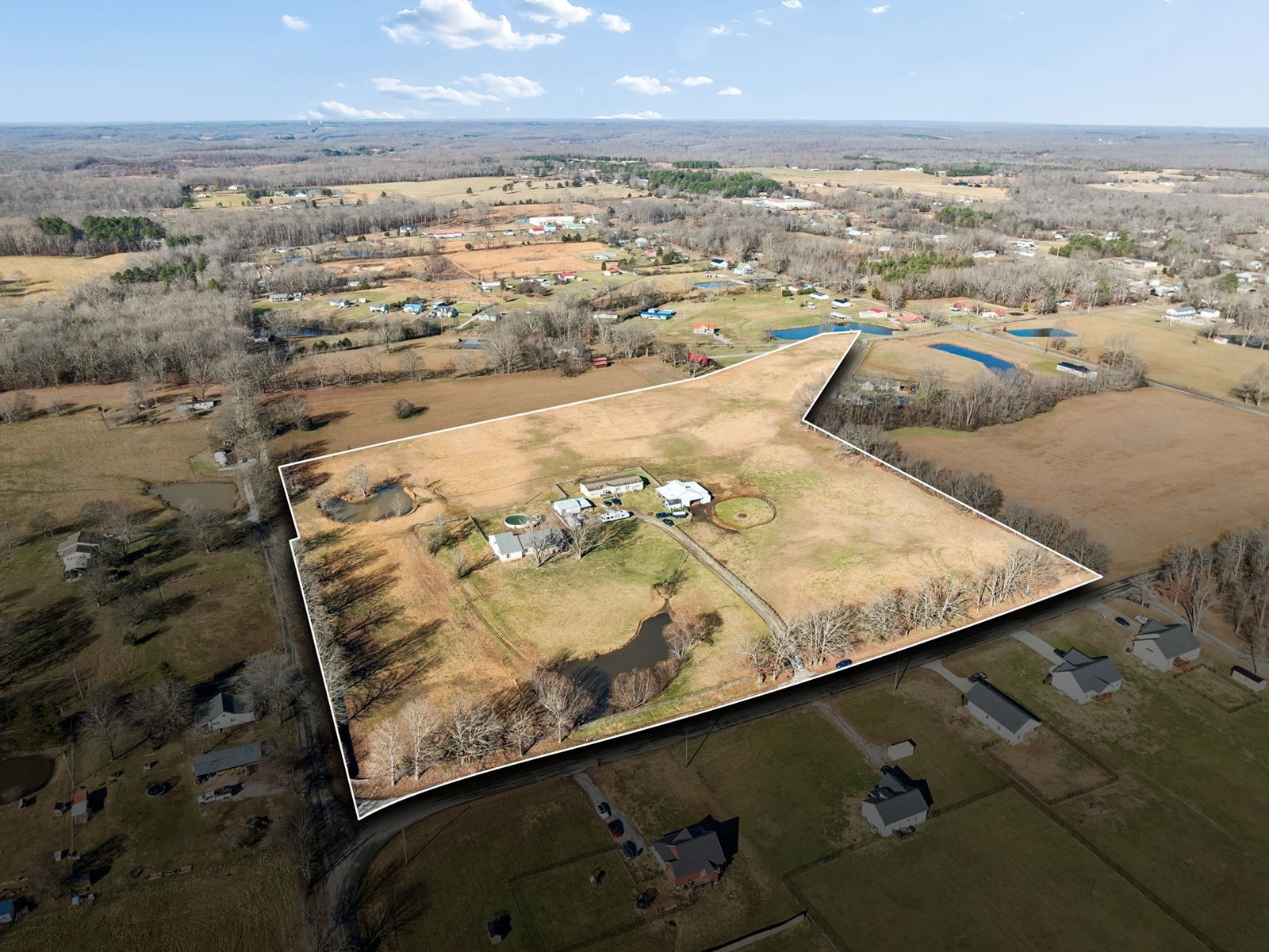 394 Pruett Road Dickson, TN 37055 - Photo 6 of 56 an aerial view of residential houses with outdoor space