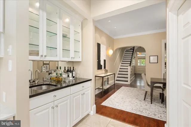 a kitchen with a sink and cabinets